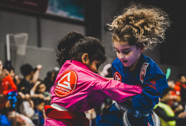 Gracie Barra Kids students training Brazilian Jiu-Jitsu at a Gracie Barra competition
